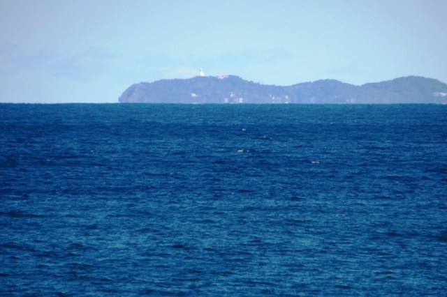 If you look carefull, you may just see a tiny lighthouse, way off in the distance.