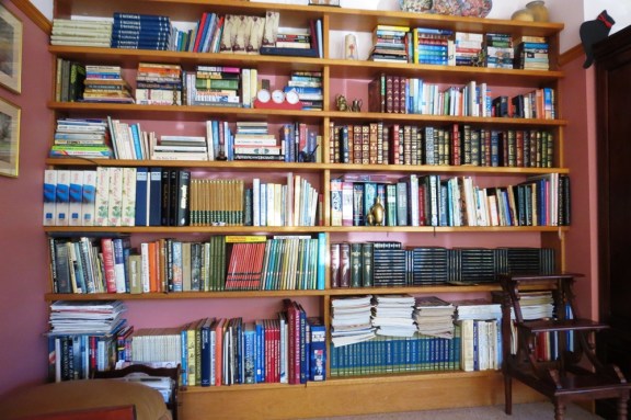 Just one of the many bookcases in my home.